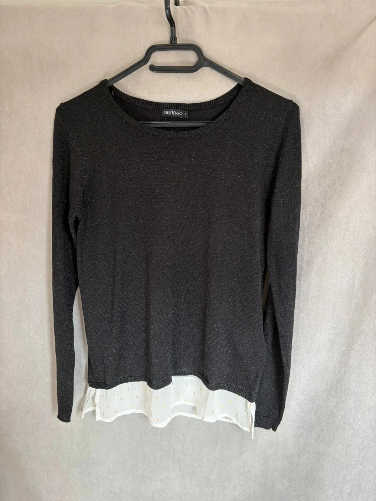 Joli pull noir à paillettes